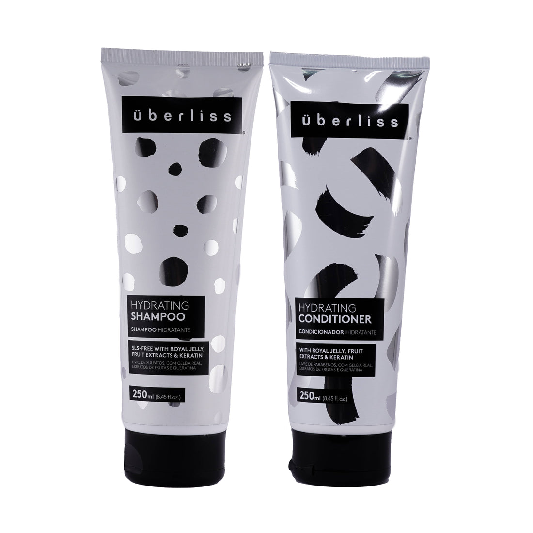Contém:

Überliss Shampoo Hidratante 250ml:
Shampoo nutritivo que limpa suavemente sem retirar nutrientes, deixando os fios hidratados, nutridos e com brilho. Facilita o pentear, fortalece e é indicado para todos os tipos de cabelo.

Ingredientes: Geléia Real, Extrato de Maçã, Extrato de Limão, Extrato de Cana de Açúcar, Queratina e Chá Verde.

Überliss Condicionador Hidratante 250ml:
Condicionador nutritivo com ativos condicionantes e antioxidantes que combate o ressecamento, retém a umidade e disciplina 