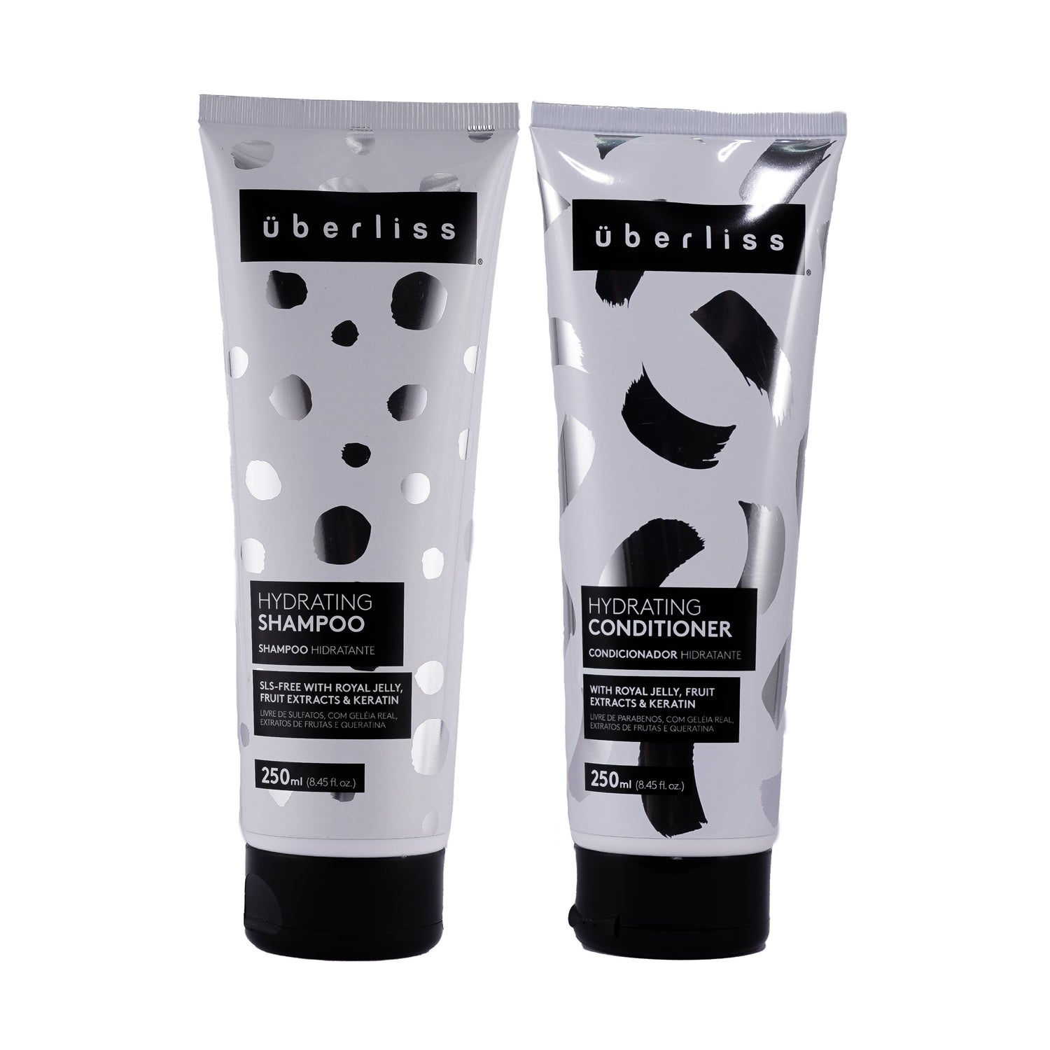 Contém:

Überliss Shampoo Hidratante 250ml:
Shampoo nutritivo que limpa suavemente sem retirar nutrientes, deixando os fios hidratados, nutridos e com brilho. Facilita o pentear, fortalece e é indicado para todos os tipos de cabelo.

Ingredientes: Geléia Real, Extrato de Maçã, Extrato de Limão, Extrato de Cana de Açúcar, Queratina e Chá Verde.

Überliss Condicionador Hidratante 250ml:
Condicionador nutritivo com ativos condicionantes e antioxidantes que combate o ressecamento, retém a umidade e disciplina 