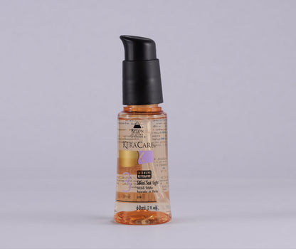 Foto do KeraCare Silk ’n’ Sea Light, sérum leve com proteção térmica, que sela pontas, dá brilho e maciez sem pesar, ideal para cabelos opacos e embaraçados.